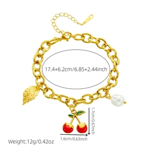 Gold chain bracelet with red cherry, pearl and leaf charms including size measurements