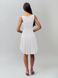 Rear view of sleek white sleeveless dress highlighting the back cut and slim-fit silhouette