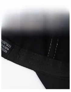 Detail of 100% cotton baseball cap interior featuring a wide moisture-wicking sweatband
