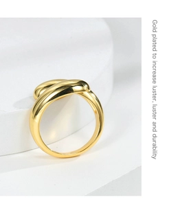 Detail showing the gold plated finish on a teardrop ring for luster and durability