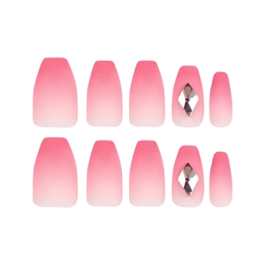 Short pink ombre press-on nails in coffin shape with silver diamond accents on white background