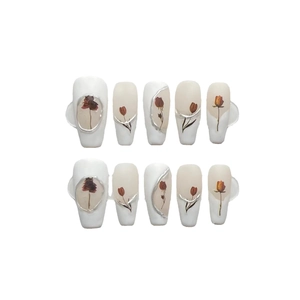 Handmade press-on nails with retro dried flowers and silver metallic relief edges