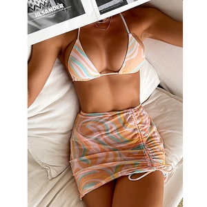 Three-piece printed triangle bikini set with halter top and drawstring side wrap skirt