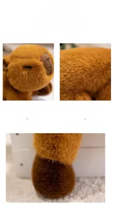 Close-up of brown capybara plush toy featuring embroidered closed eyes and soft fur texture
