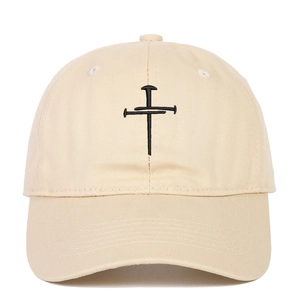 Unisex beige cotton baseball cap featuring black cross embroidery with curved brim