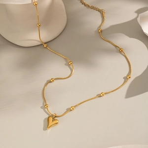 Minimalist 18K gold plated stainless steel necklace with heart pendant and bead details