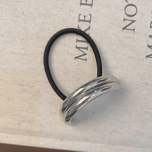 Minimalist black elastic hair tie with a sleek double-layered silver geometric metal ring