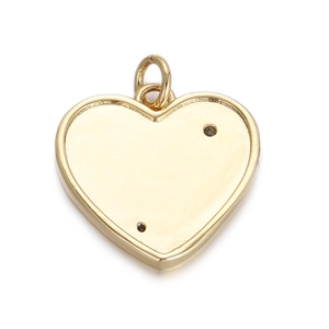 Detailed close-up of a polished gold heart-shaped pendant accessory for custom jewelry