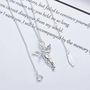 Elegant 925 sterling silver angel pendant necklace displayed on a poetic white background