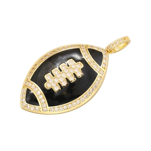 Detail shot of golden football pendant with black finish and sparkling cubic zirconia