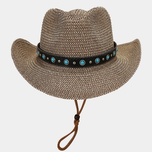 Detail of hand-woven retro Panama straw hat with turquoise beads and chin strap