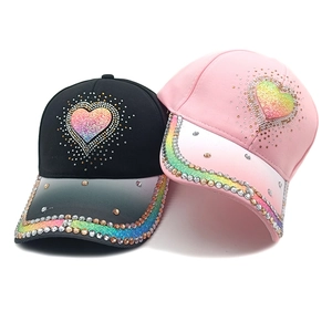 Black and pink women's baseball caps with sequin rainbow heart and rhinestone details