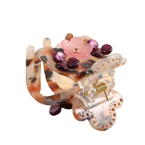 Floral acetate hair claw clip with tortoise shell pattern and colorful resin flowers