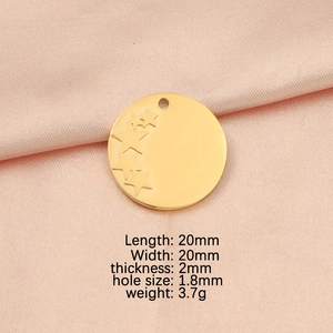Detailed size specifications of gold star round pendant on pink silk background