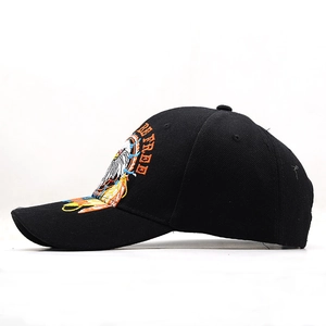 Detailed embroidery of an eagle and 'FREE' text on a black cotton twill baseball cap