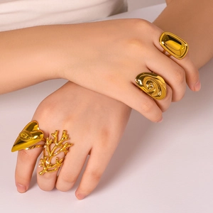 Polished 18K gold stainless steel chunky ring set with heart and coral textures