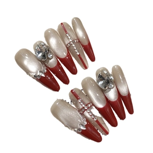 French luxury long almond press-on nails with red cross rhinestones and crystal accents