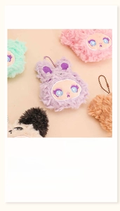 Detail of plush animal keychains with fluffy rabbit fur texture and bead chain hooks
