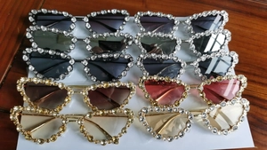 Top view of cat eye heart sunglasses with rhinestone frames in multiple colors