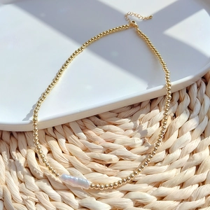 Bohemian gold-plated necklace with irregular natural freshwater pearl and bead chain
