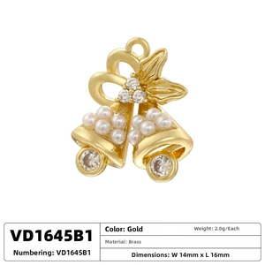 Macro view of gold Christmas bell pendant with brass material specifications and dimensions