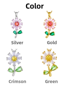 Close-up of elegant zircon daisy flower pendants in gold and silver plating