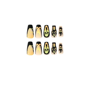 Halloween matte black coffin press-on nails featuring spider webs and skulls motifs