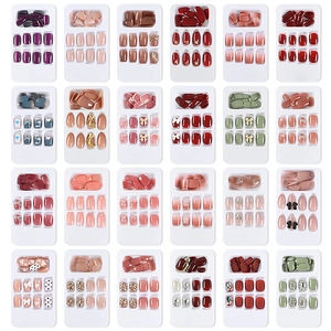 Assorted 24-box set of luxury handmade press-on nails with glitter and rhinestones