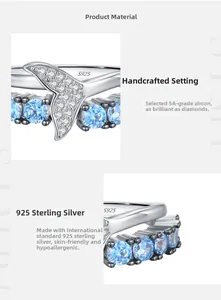 Detailed macro of S925 sterling silver mermaid tail ring with blue and white zircons