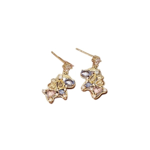 Elegant gold hollow horse stud earrings with multi-color stones and diamonds on white background