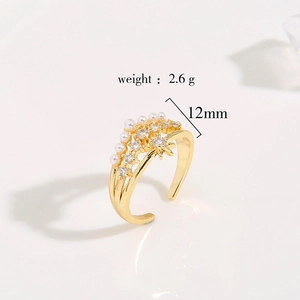 Macro detail of gold pearl zircon ring showing 2.6g weight and 12mm width measurements