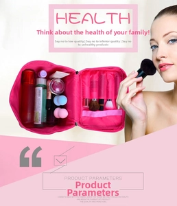 Macro view of rose pink double-layer makeup bag with brushes and cosmetic storage space