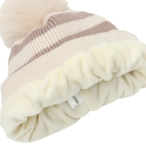Detailed view of striped knit beanie showing thick fleece lining and faux fur pompom