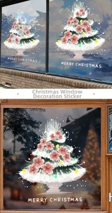 Detailansicht der weißen Weihnachtsbaum-Fensteraufkleber mit rosa Blumen und Weihnachtsgrüßen