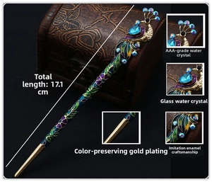 Macro detail of a 17.1cm vintage peacock hair pin with blue crystals and enamel