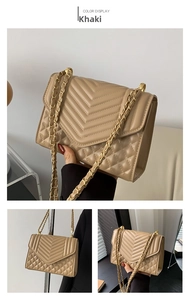 Detail of khaki shoulder bag featuring V-shaped quilting and diamond pattern textures