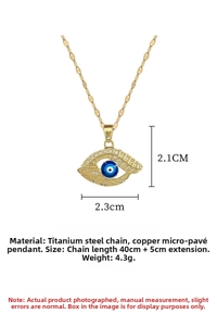 Detailed view of evil eye necklace with dimensions showing 2.3cm width and zircon stones