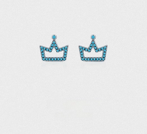 Detailed close-up of crown earrings in sterling silver with turquoise-colored bead accents