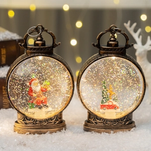Set of two vintage bronze Santa and red truck lanterns with glowing snow globe effect