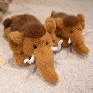 Plush mammoth stuffed animal toy with soft brown fur and iconic white curved tusks