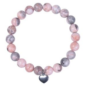 Detail of pink zebra jasper beads with silver heart pendant on a white background
