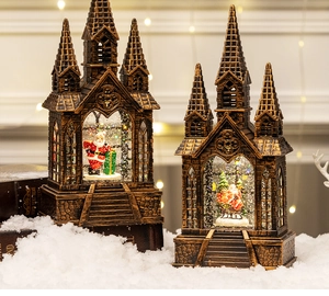 Detail of vintage bronze Christmas lantern with Santa scene and warm LED glowing light