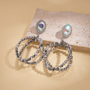 Exaggerated geometric oval earrings with iridescent crystals and silver metal beads