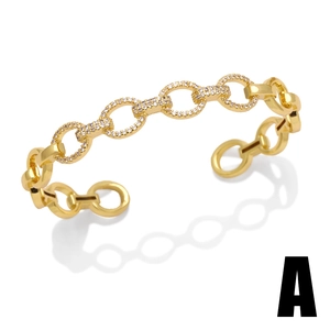 Bracelet jonc ouvert doré avec maillons circulaires sertis de zircons blancs