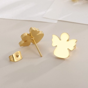 Detailed close-up of gold-plated angel stud earrings and metal butterfly backings
