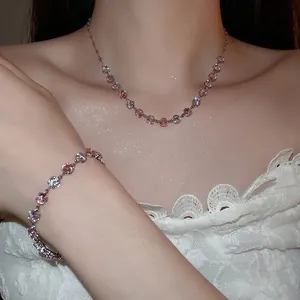 Sparkling round zircon necklace and bracelet jewelry set in silver with pink stones