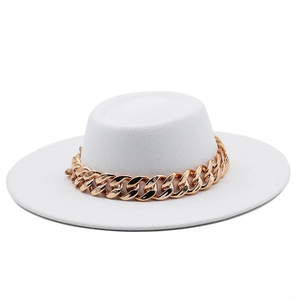 Detailed close-up of a white wool felt fedora featuring a thick gold chain decorative band