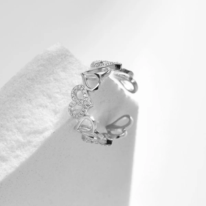 Minimalist 925 sterling silver open heart ring with sparkling stones on stone base
