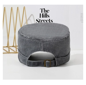 Detailed back view of grey washed denim cadet cap featuring adjustable brass metal buckle