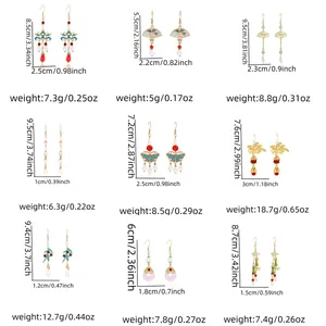 Detailed size chart showing length and weight measurements for nine pearl tassel earrings